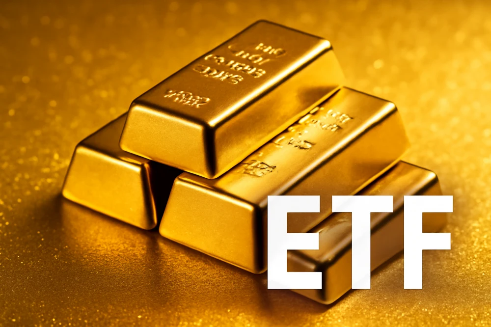 번쩍 번쩍 빛나는 골드바가 쌓여 있는 모습과 ETF 텍스트가 겹쳐있는 이미지